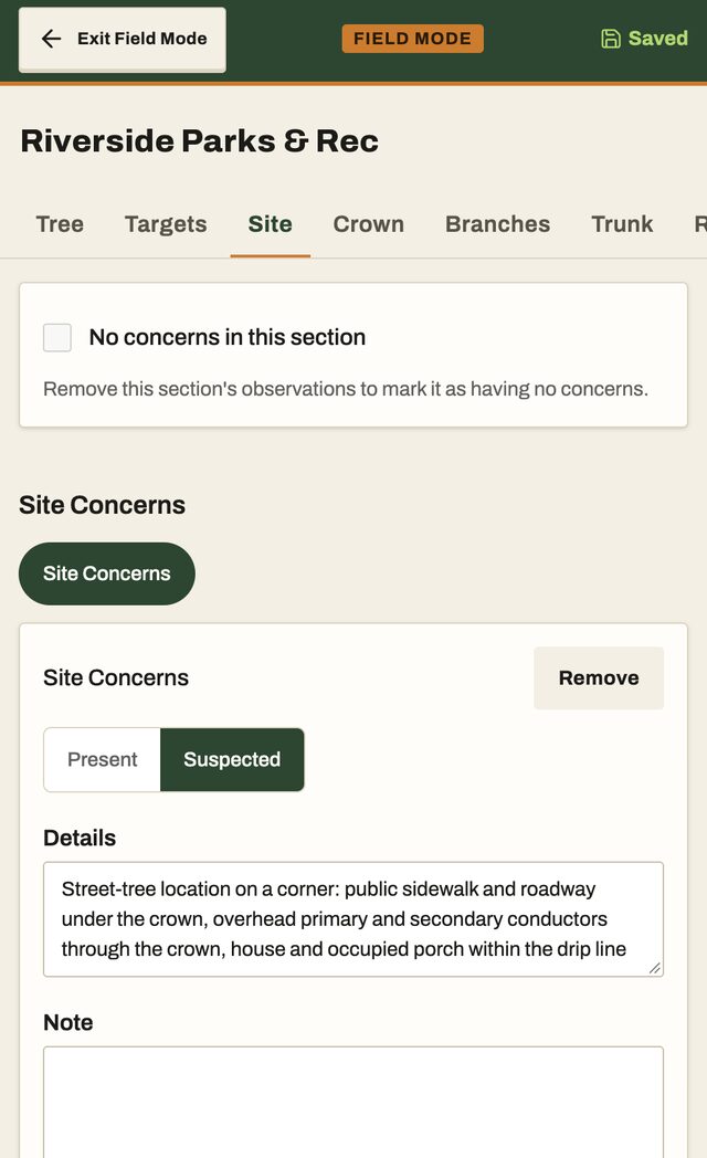 The Site tab in field mode on a phone: a site concern marked suspected, with its details.